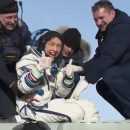 NASA astronaut Christina Koch is all smiles after setting women’s record with 328-day space flight