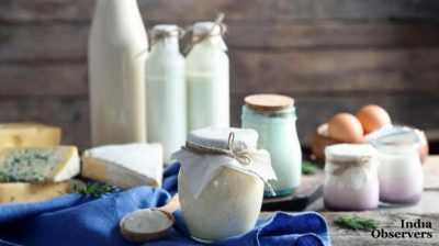 Set of dairy products on wooden table closeup