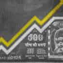 A money bill drawn on a chalk board looking like a growth graph with an upwards pointing arrow symbolizing economic relationships.