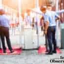 Blurred Airport security check at gates with metal detector and scanner to prevent from Corona Virus