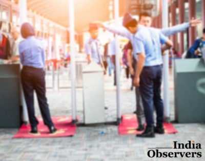 Blurred Airport security check at gates with metal detector and scanner to prevent from Corona Virus