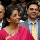 india's finance minister nirmala sitharaman (c) and krishnamurthy subramanian (r), chief economic adviser pose during a photo opportunity outside their office before the presentation of the federal budget in the parliament in new delhi