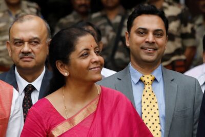 india's finance minister nirmala sitharaman (c) and krishnamurthy subramanian (r), chief economic adviser pose during a photo opportunity outside their office before the presentation of the federal budget in the parliament in new delhi