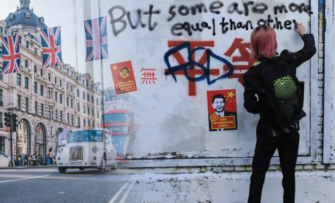 chinese-political-slogans-appear-as-graffiti-on-london-street-art-wall