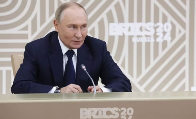 russian president putin reveals brics banknote