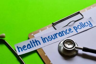 health insurance policy on healthcare concept with green background